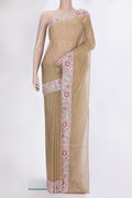 Beige Dual Tone Organza Saree with Embroidered on the body and Sequin Border.  displayed on a mannequin