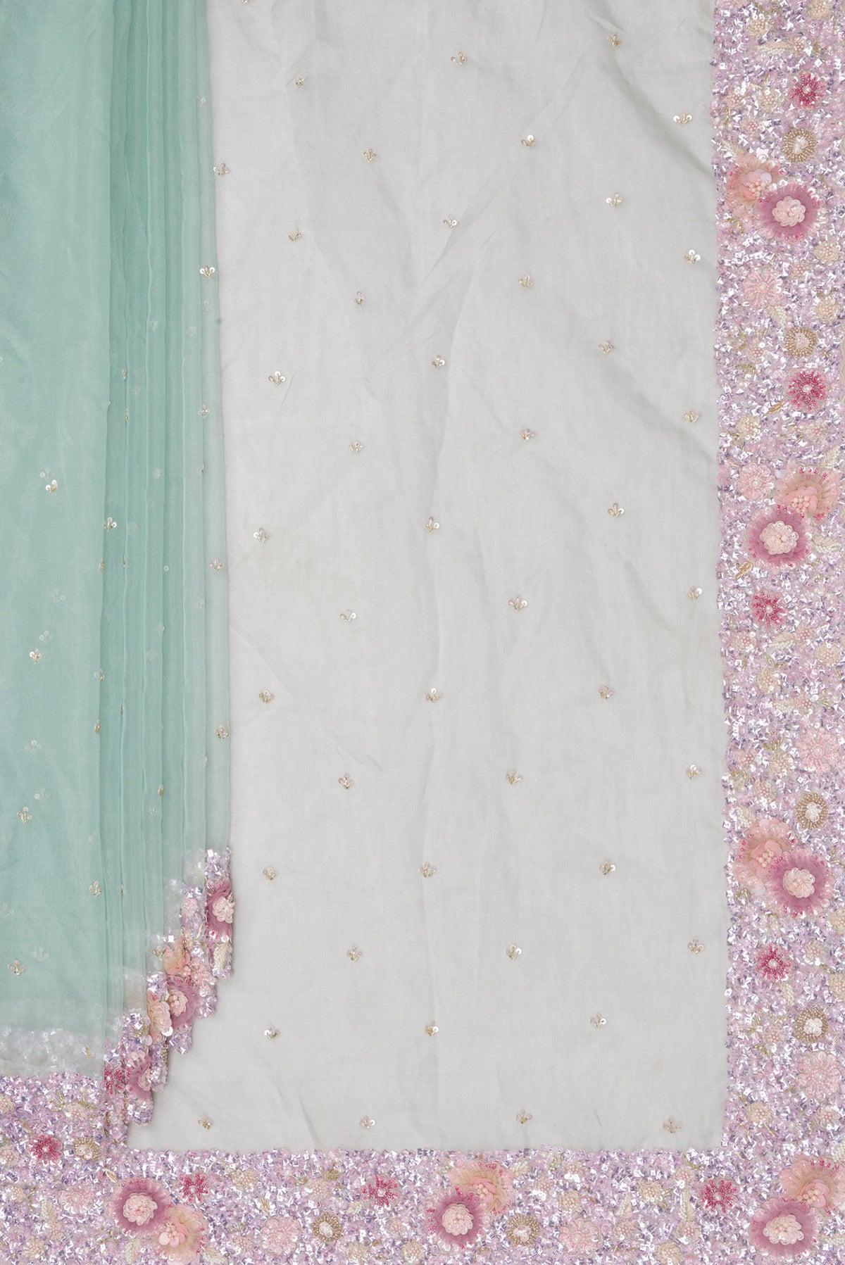 Pleats and pallu of Pure Silk Light Blue Organza Saree with Embroidered on the body and Embroidered Border. 