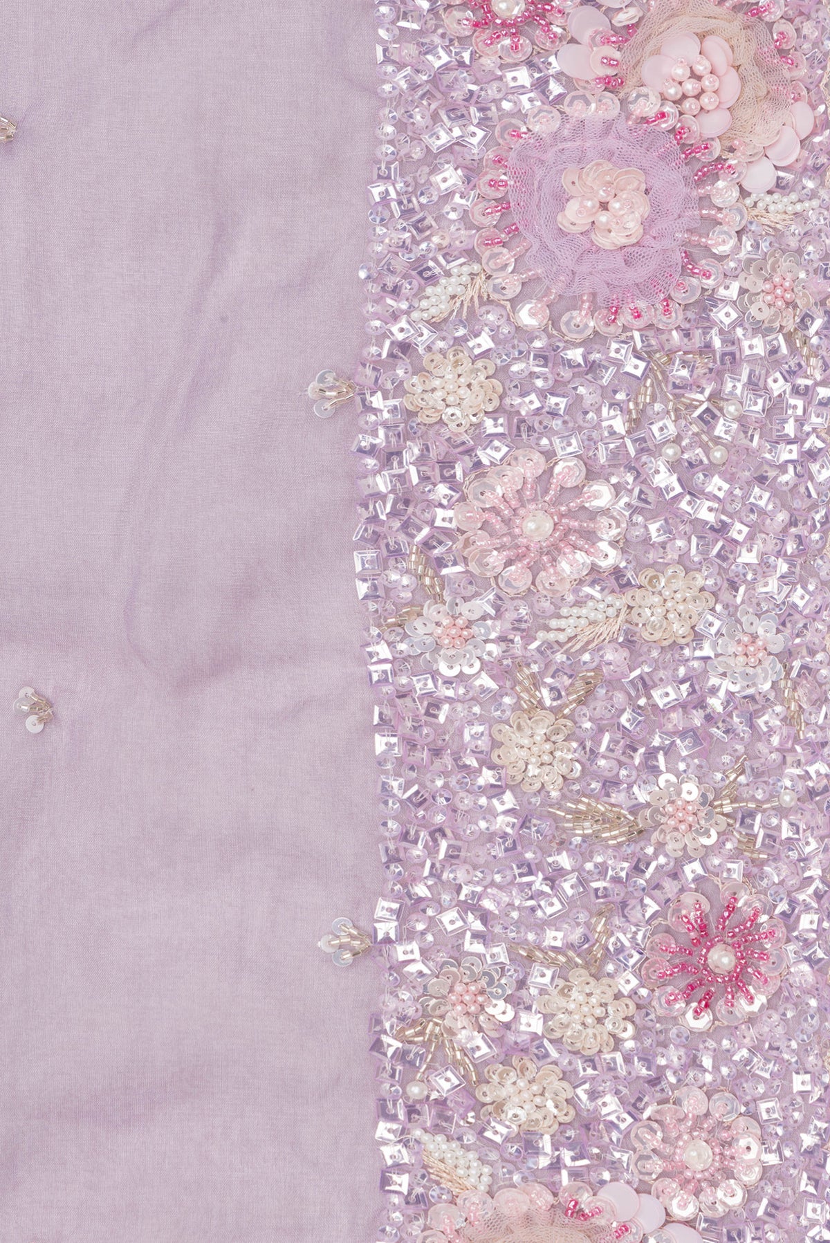 Border image of Pure Silk Lavender Dual Tone Organza Saree with Embroidery on the body and Sequin Border. 