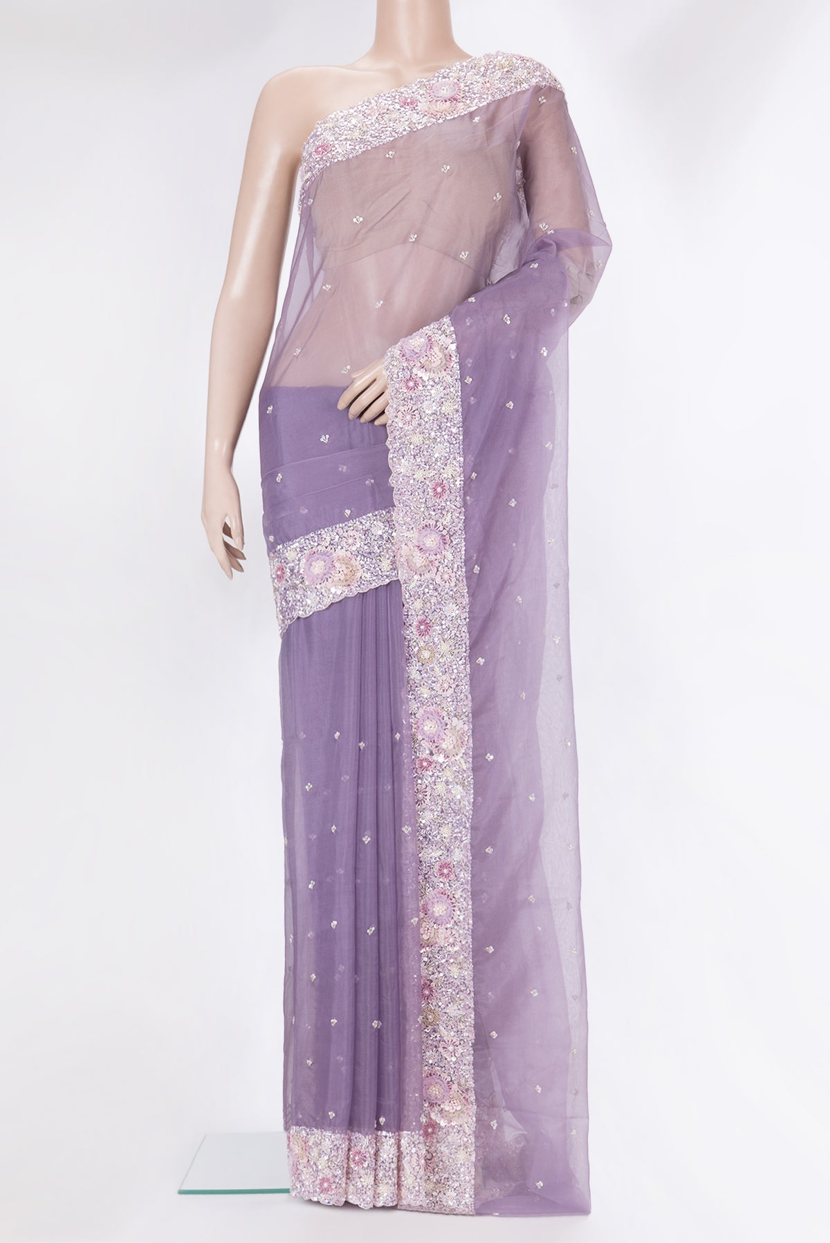 Pure Silk Lavender Dual Tone Organza Saree with Embroidery on the body and Sequin Border.  displayed on a mannequin