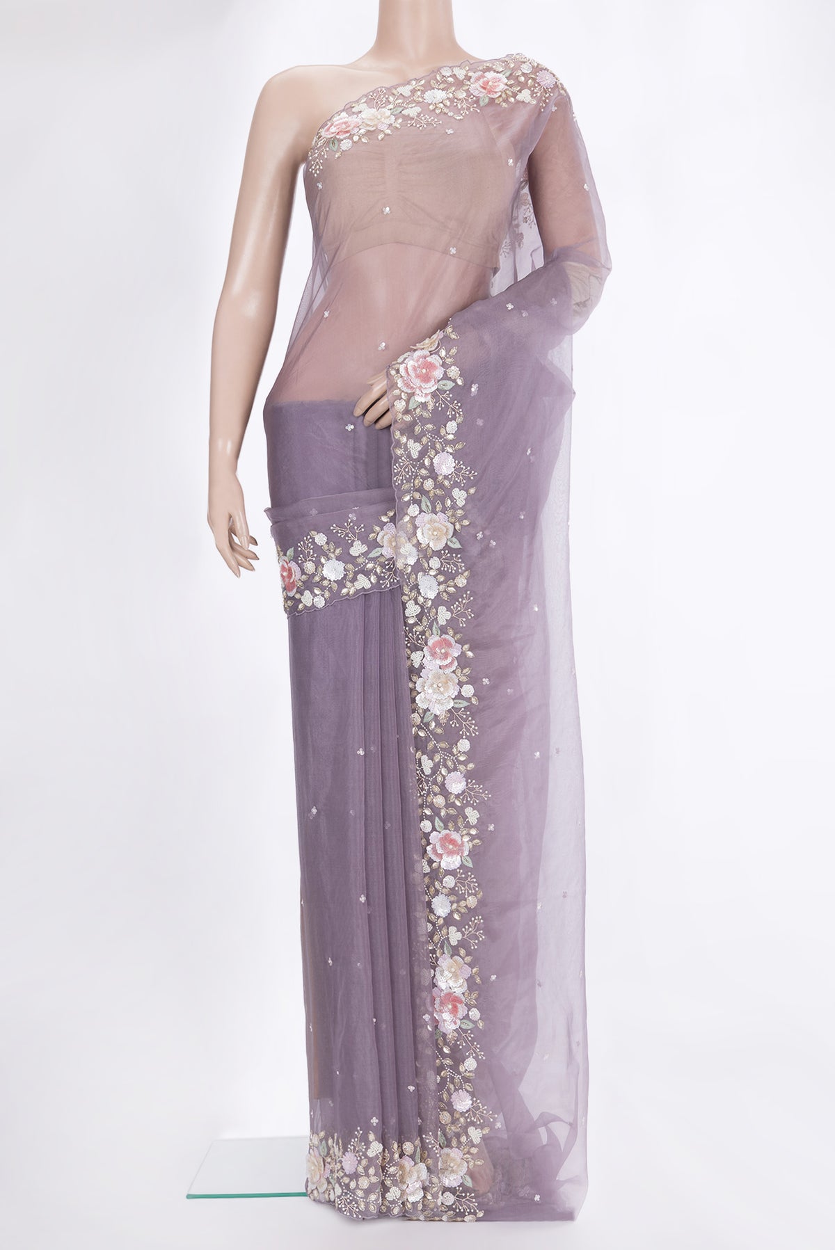 Grey Organza Saree with Embroidered on the body and Sequin Border.  displayed on a mannequin