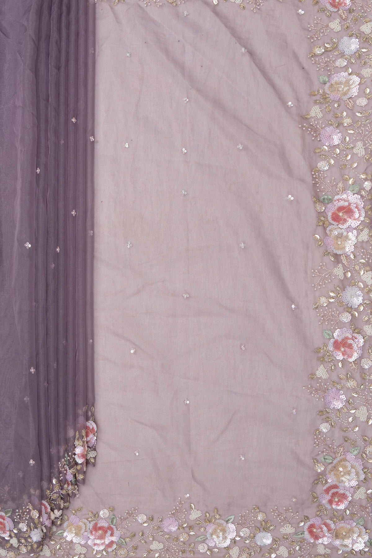 Pleats and pallu of Grey Organza Saree with Embroidered on the body and Sequin Border. 