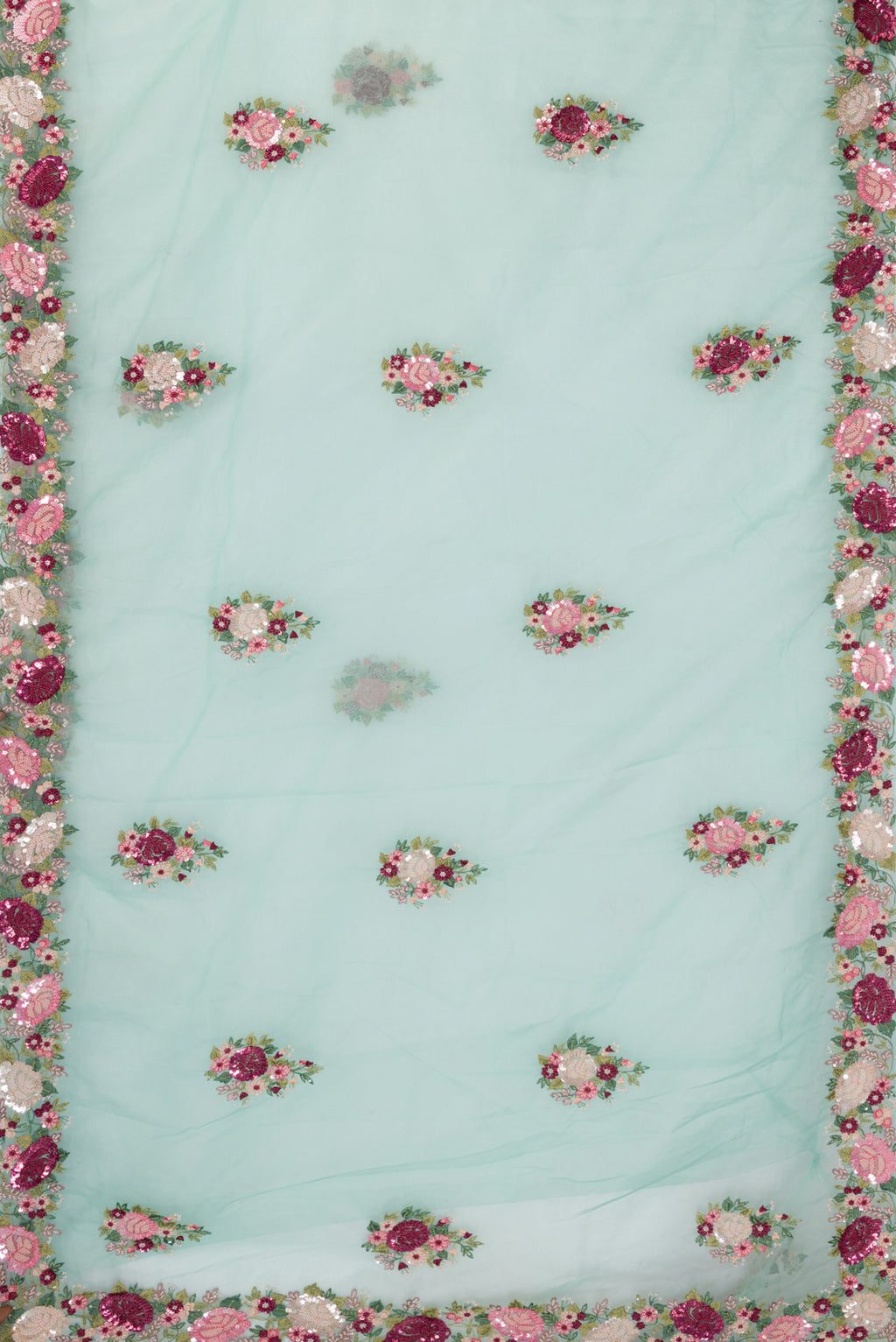 Flat view of Light Blue Organza Saree with Embroidered on the body and Sequin Border. 