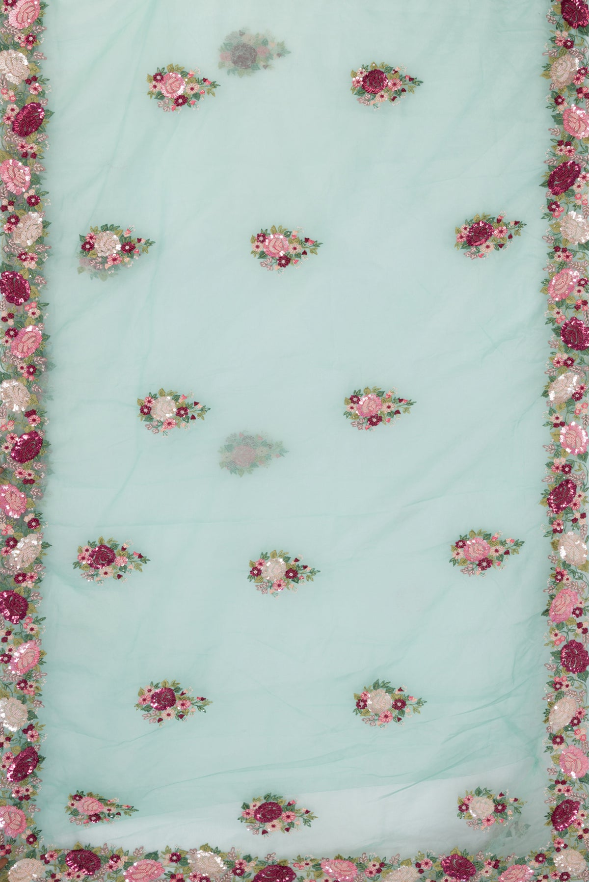 Flat view of Light Blue Organza Saree with Embroidered on the body and Sequin Border. 