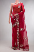 Red Organza Saree with Embroidered on the body and Sequin Border.  displayed on a mannequin
