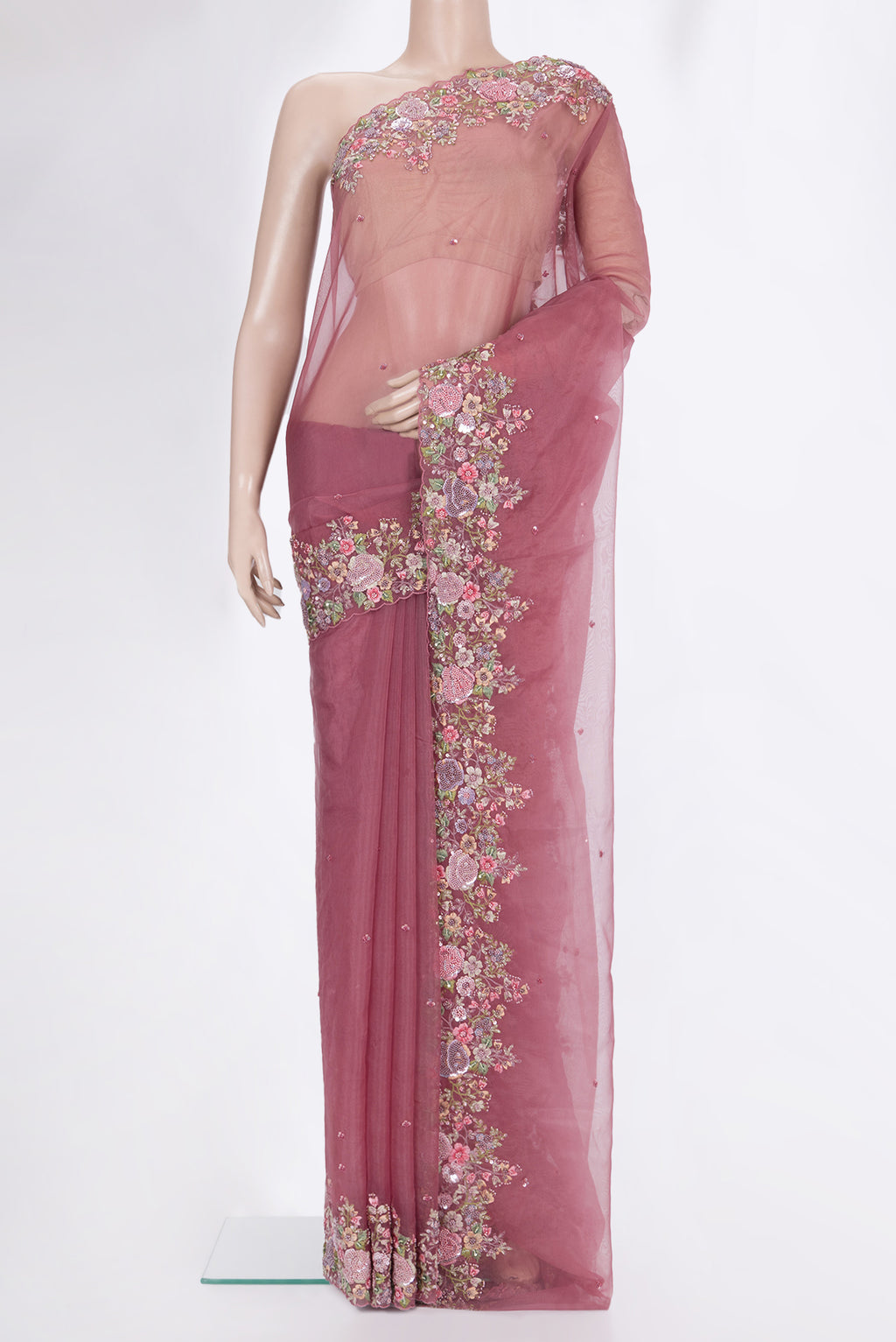 Mauve Organza Saree with Embroidered on the body and Embroidered Border.  displayed on a mannequin