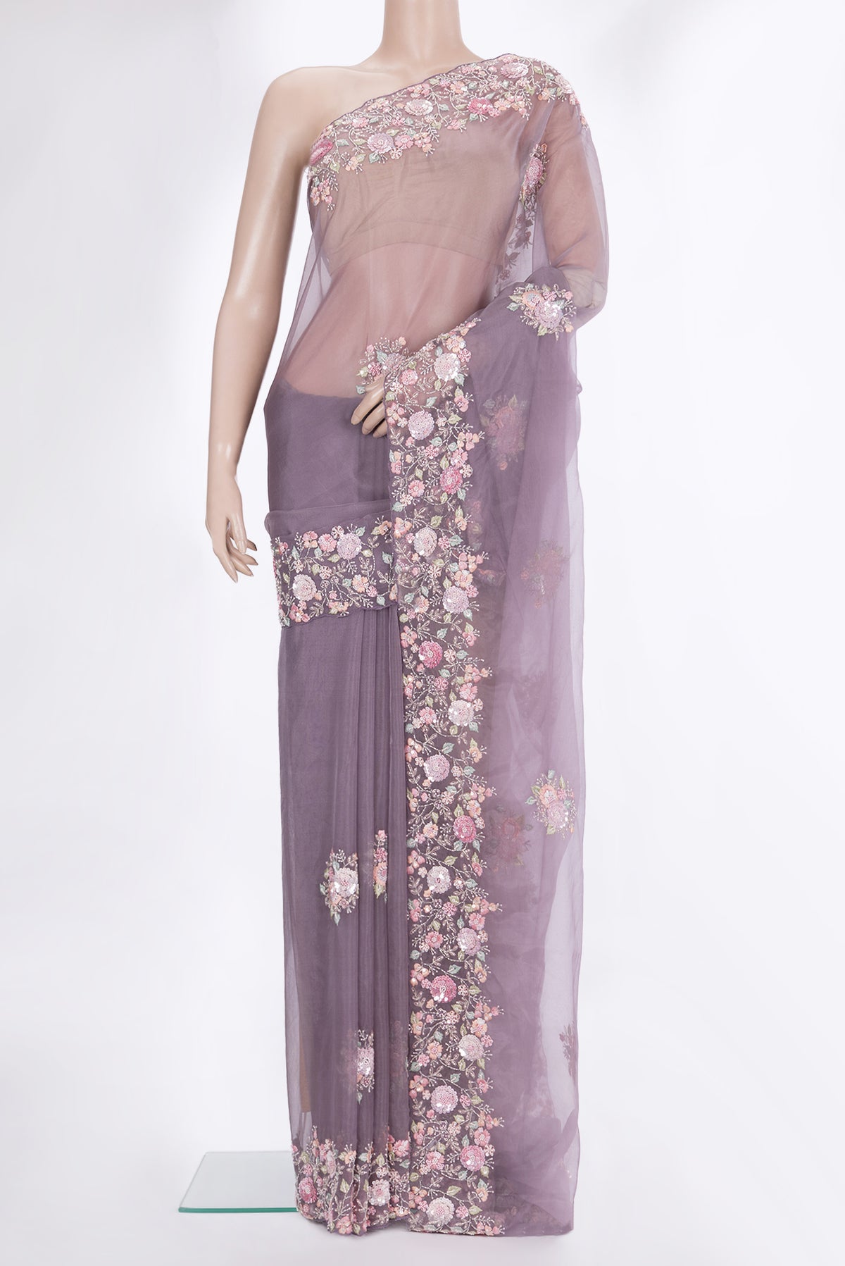 Grey Organza Saree with Embroidered on the body and Sequin Border.  displayed on a mannequin