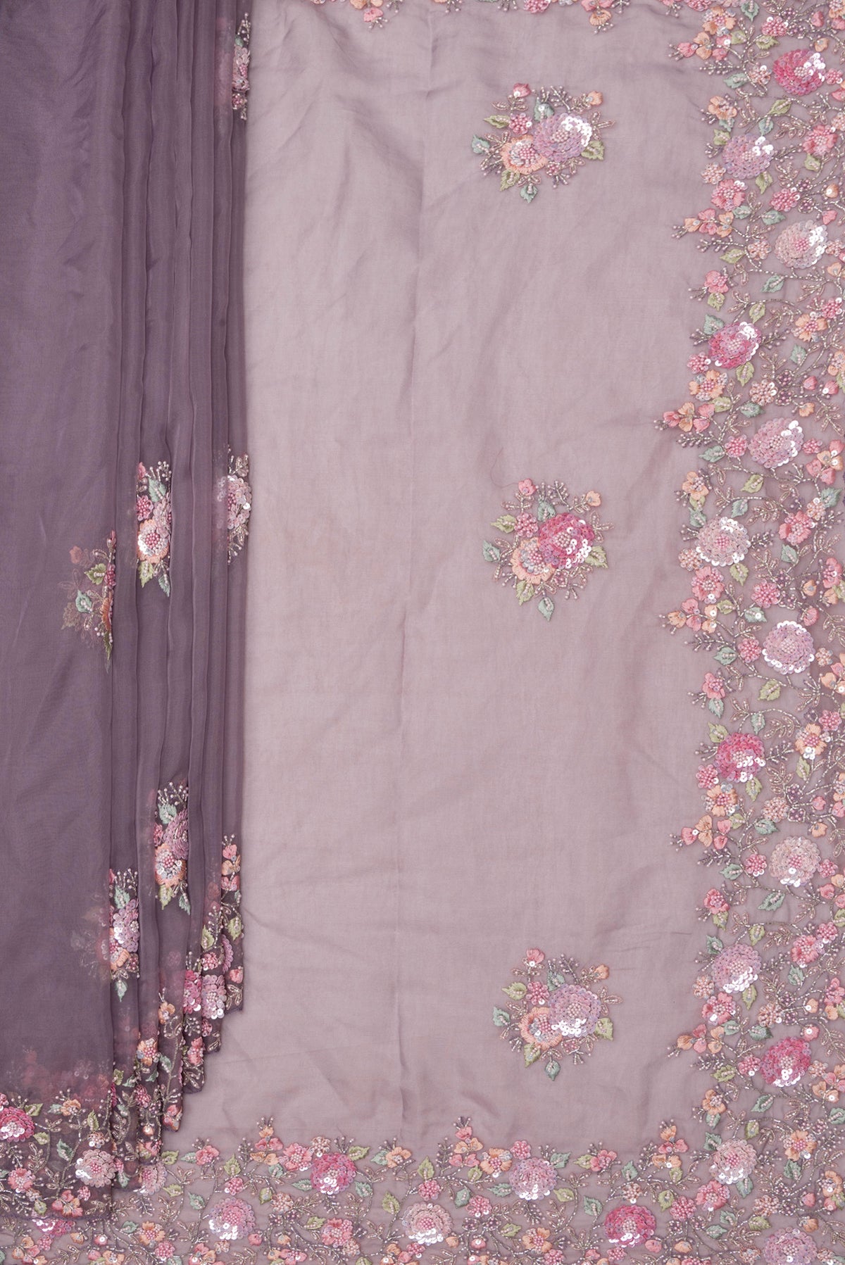 Pleats and pallu of Grey Organza Saree with Embroidered on the body and Sequin Border. 