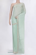 Mint Green Crepe Saree with Embroidered on the body and Sequin Border.  displayed on a mannequin