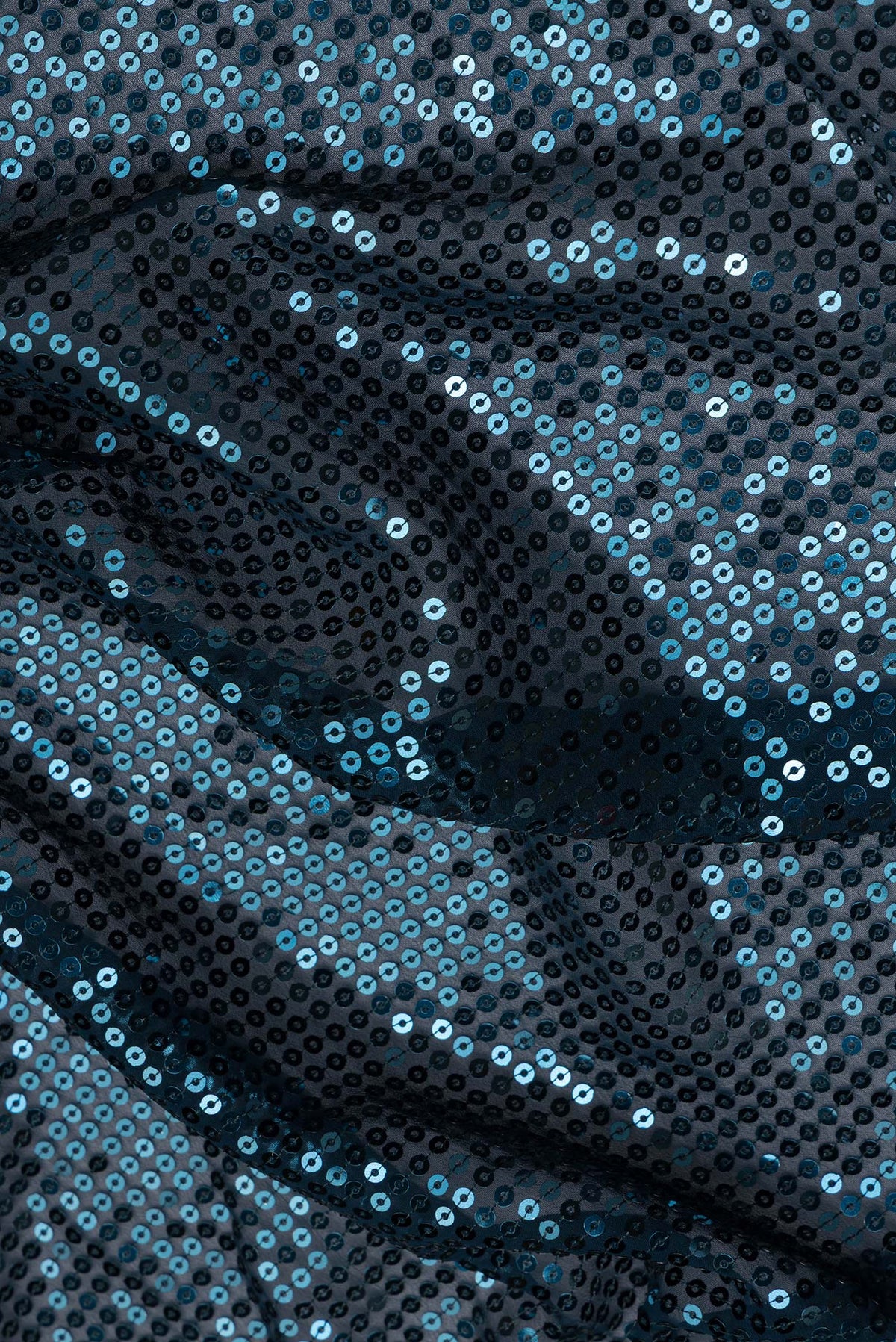 Close up of Navy Blue Dual Tone Georgette Saree with Embroidery on the body and Sequin Border.  displaying folds