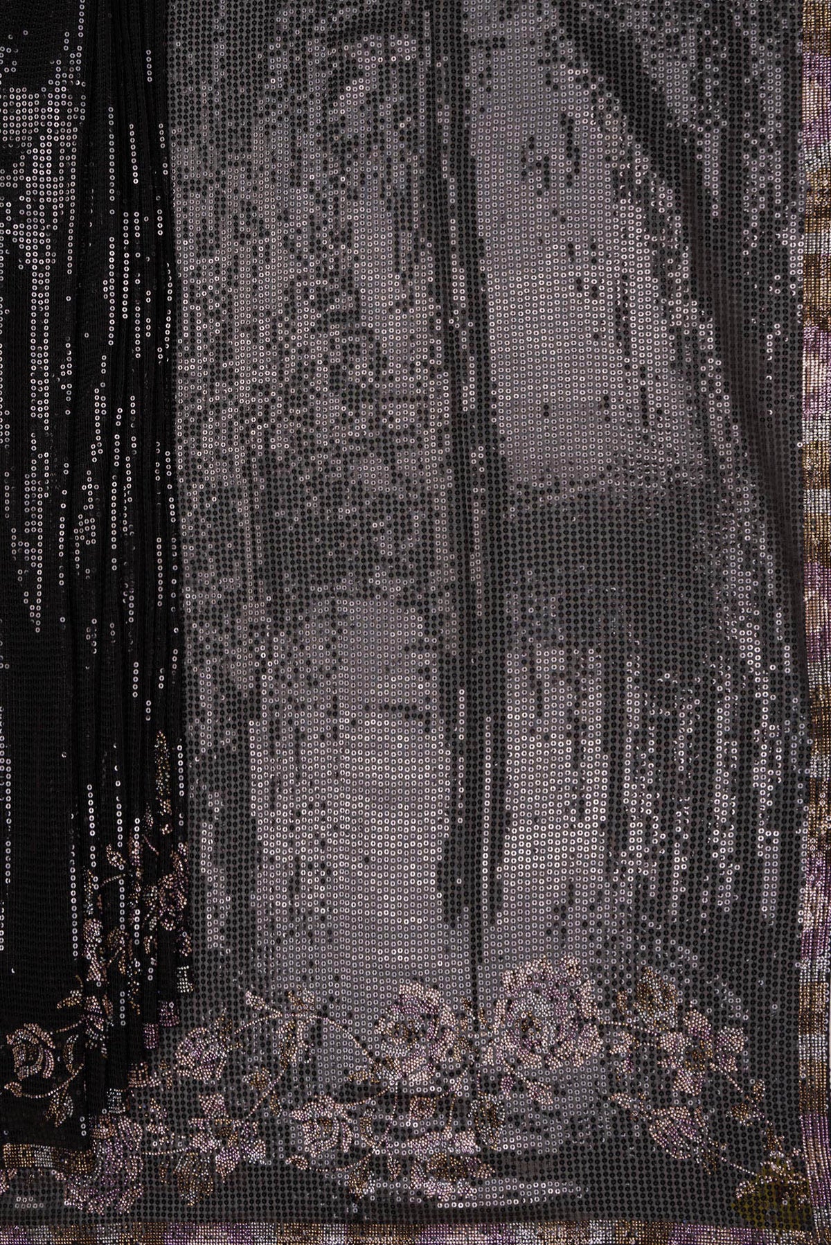 Pleats and pallu of Black Georgette Saree with Embroidered on the body and Sequin Border. 