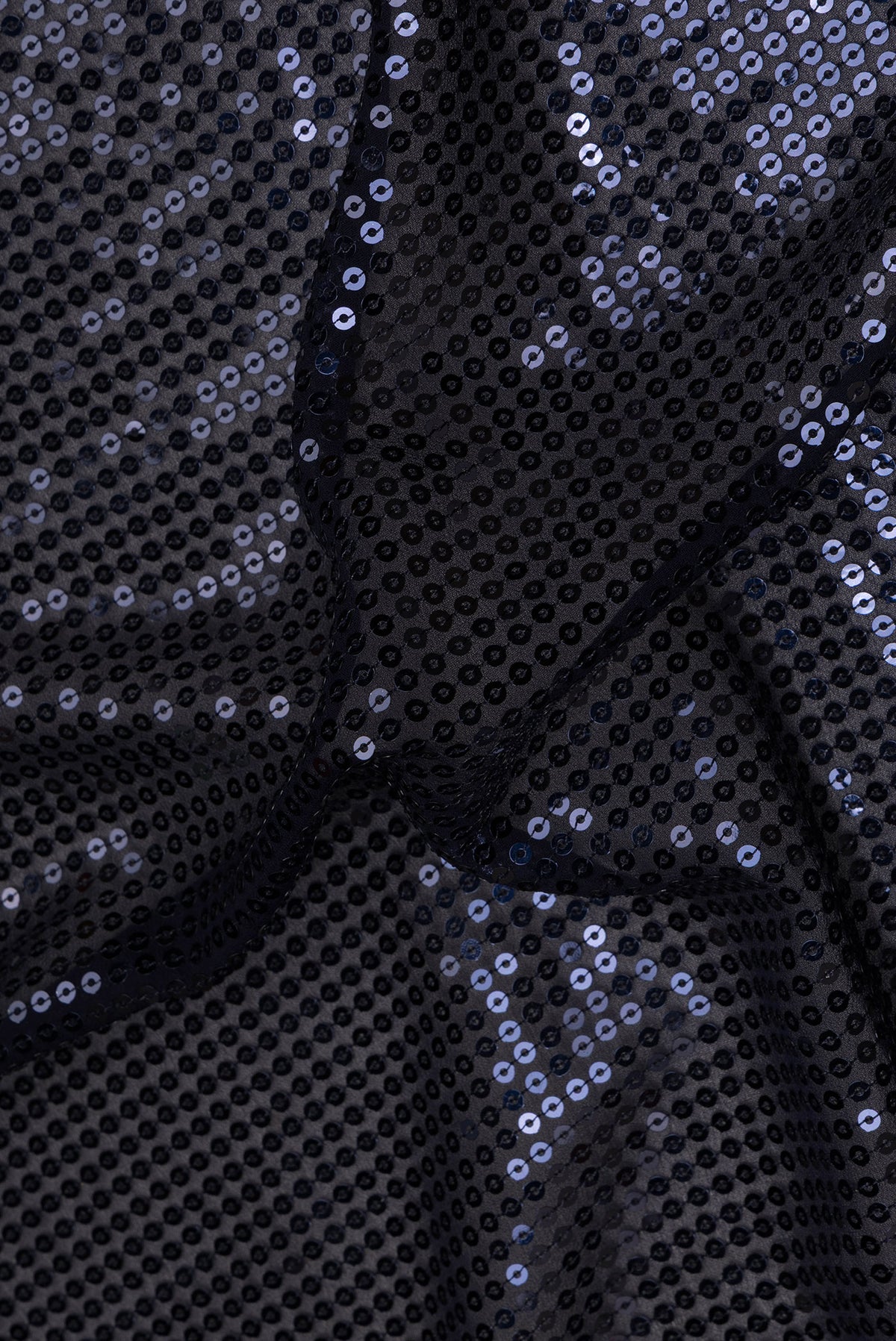 Close up of Navy Blue Georgette Saree with Embroidered on the body and Sequin Border.  displaying folds