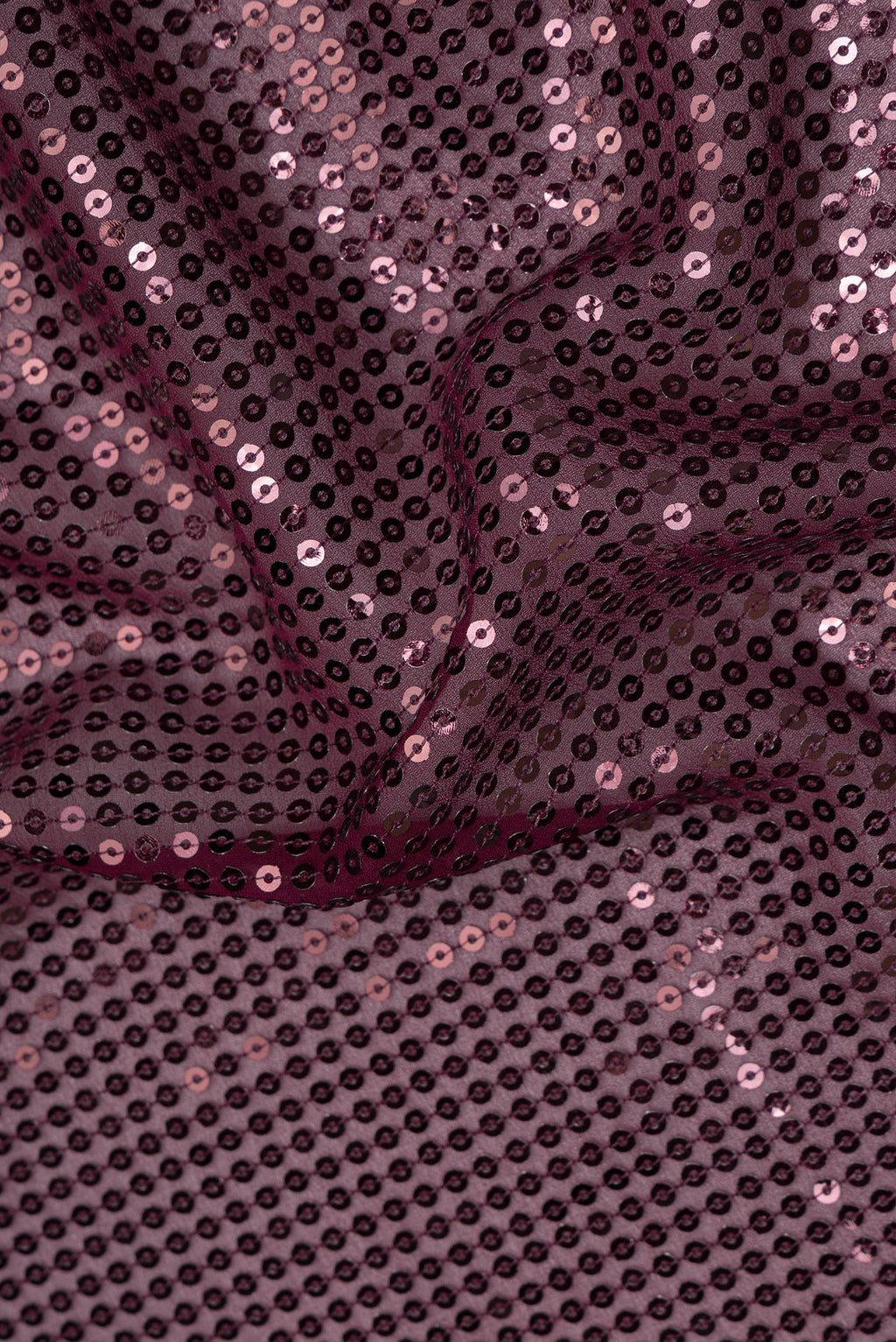 Close up of Burgundy Dual Tone Georgette Saree with Embroidery on the body and Sequin Border.  displaying folds