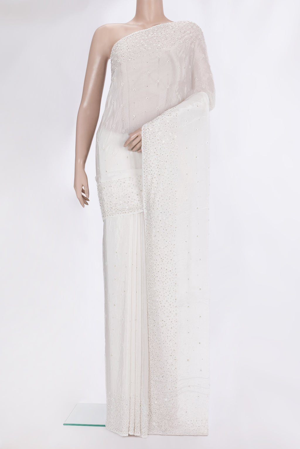 White Organza Saree with Embroidered on the body and Sequin Border.  displayed on a mannequin