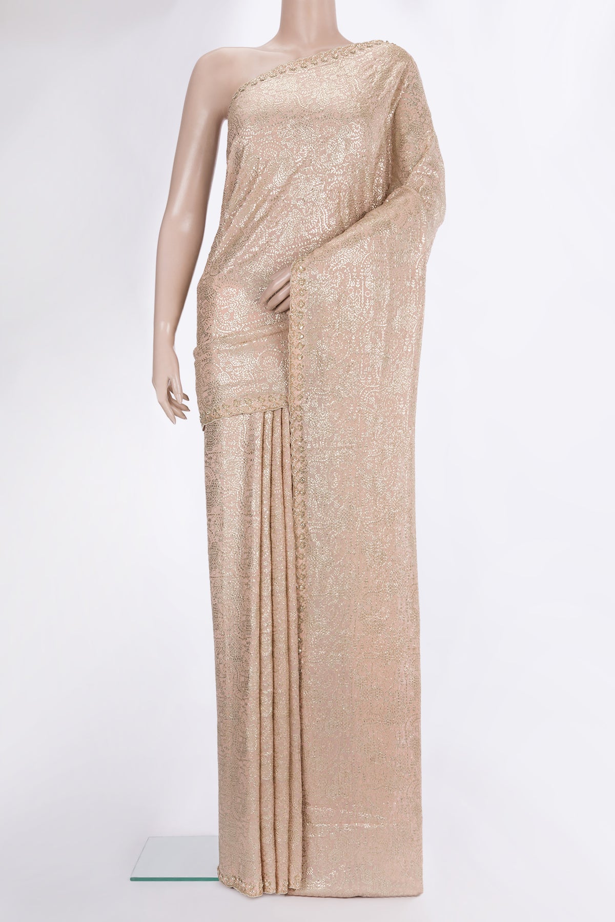 Peach Dual Tone Georgette Saree with Embroidered on the body and Sequin Border.  displayed on a mannequin
