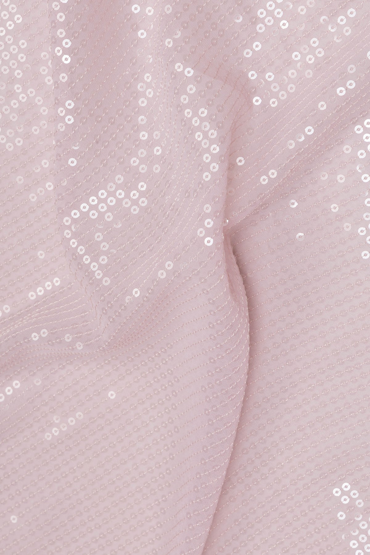 Close up of Rose pink Dual Tone Georgette Saree with Embroidery on the body and Sequin Border.  displaying folds
