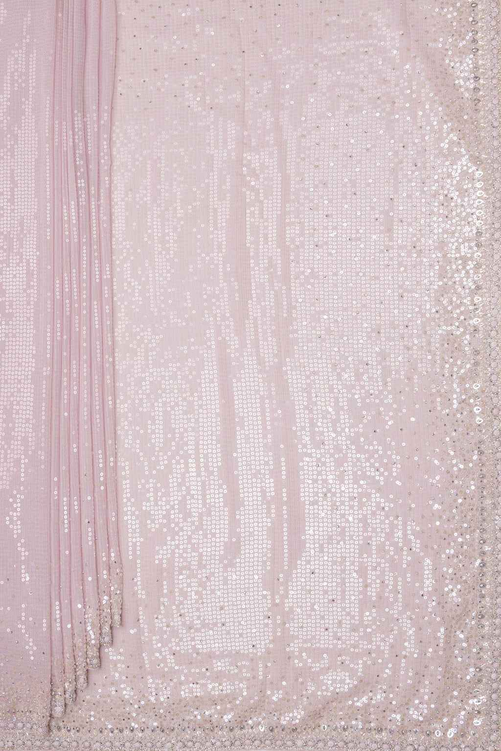 Pleats and pallu of Rose pink Dual Tone Georgette Saree with Embroidery on the body and Sequin Border. 