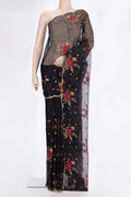 Black Organza Saree with Embroidered on the body and Embroidered Border.  displayed on a mannequin