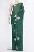 Bottle Green Crepe Saree with Embroidered on the body and Sequin Border.  displayed on a mannequin