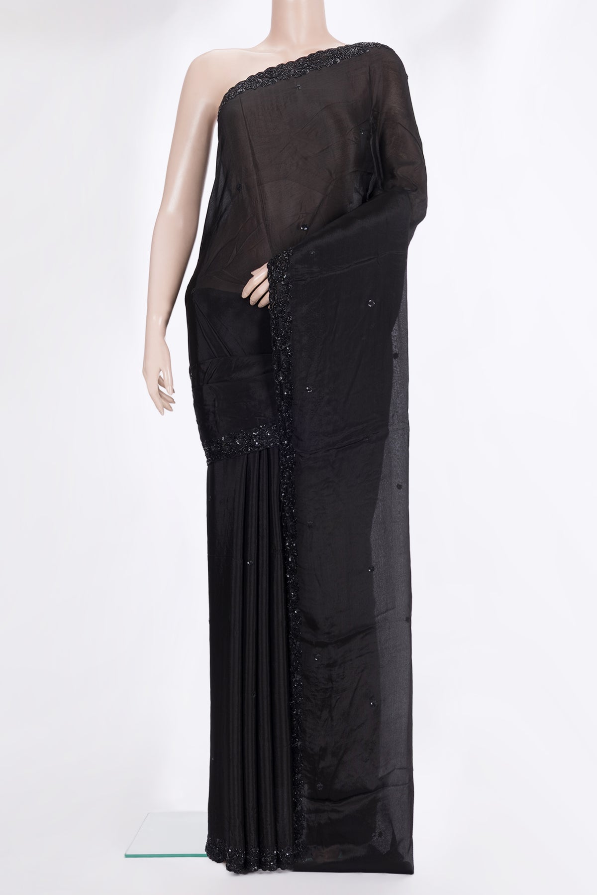 Black Crepe Saree with Embroidered on the body and Sequin Border.  displayed on a mannequin