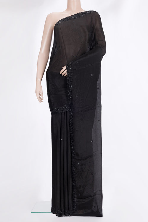 Black Crepe Saree with Embroidered on the body and Sequin Border.  displayed on a mannequin