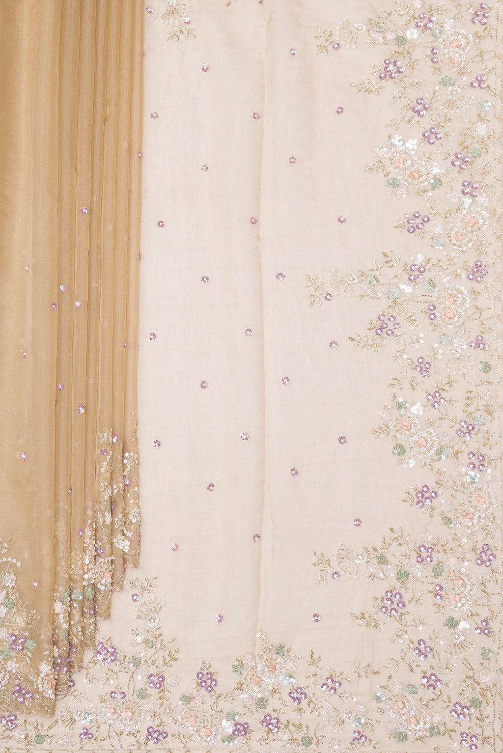 Pleats and pallu of Dark Beige Organza Saree with Embroidery on the body and Sequin Border. 