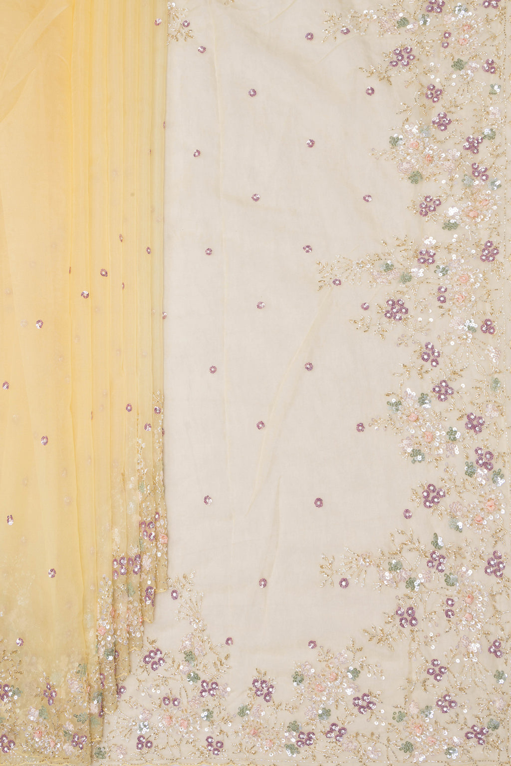 Pleats and pallu of Sandal Organza Saree with Embroidery on the body and Sequin Border. 