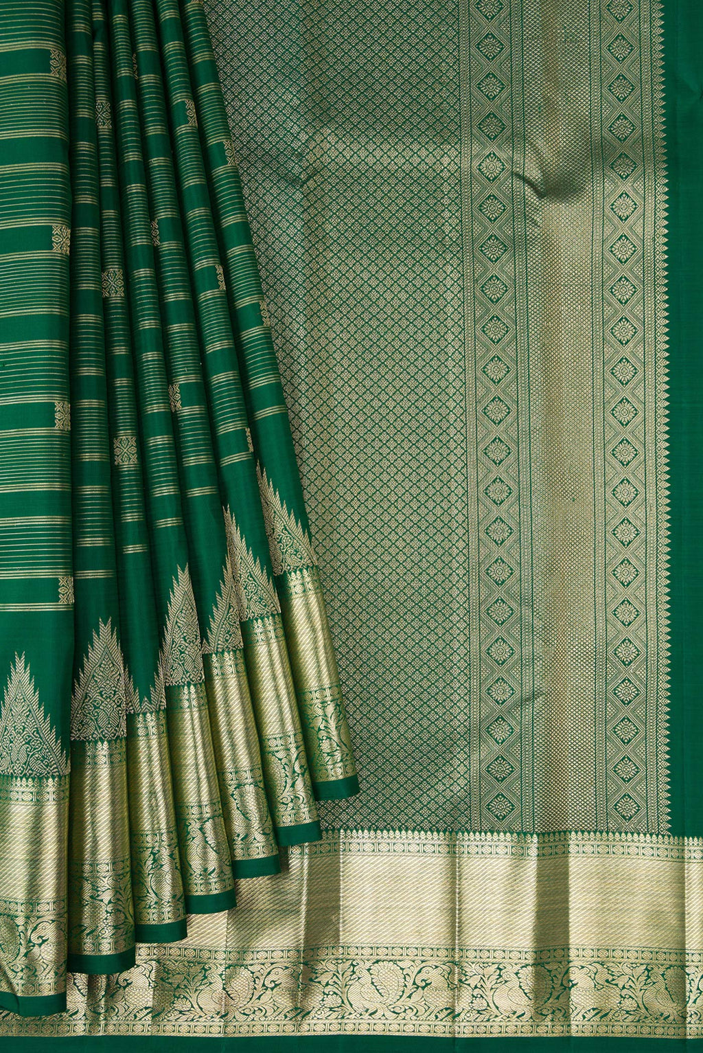 Pleats and pallu of Bottle Green Kanchipuram Silk Saree with Stripes on the body and Fancy Border. 