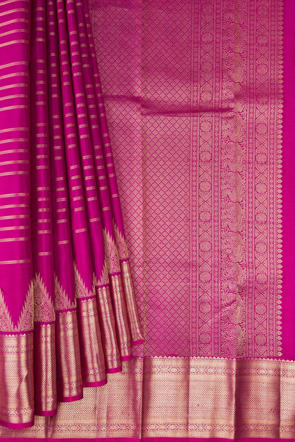 Pleats and pallu of Pure Silk Rani Pink Kanchipuram Saree with Stripes on the body and Zari Border. 