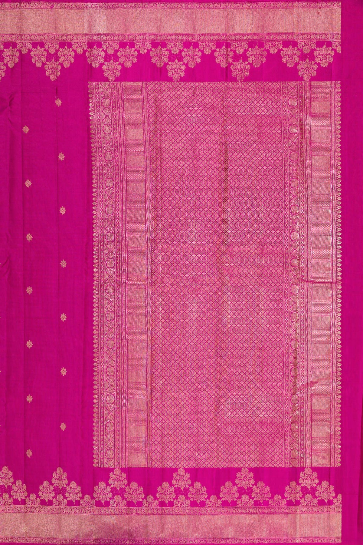 Close up image of the pallu of Pure Silk Magenta Kanjivaram Saree with Zari Butta on the body and Fancy Border. 