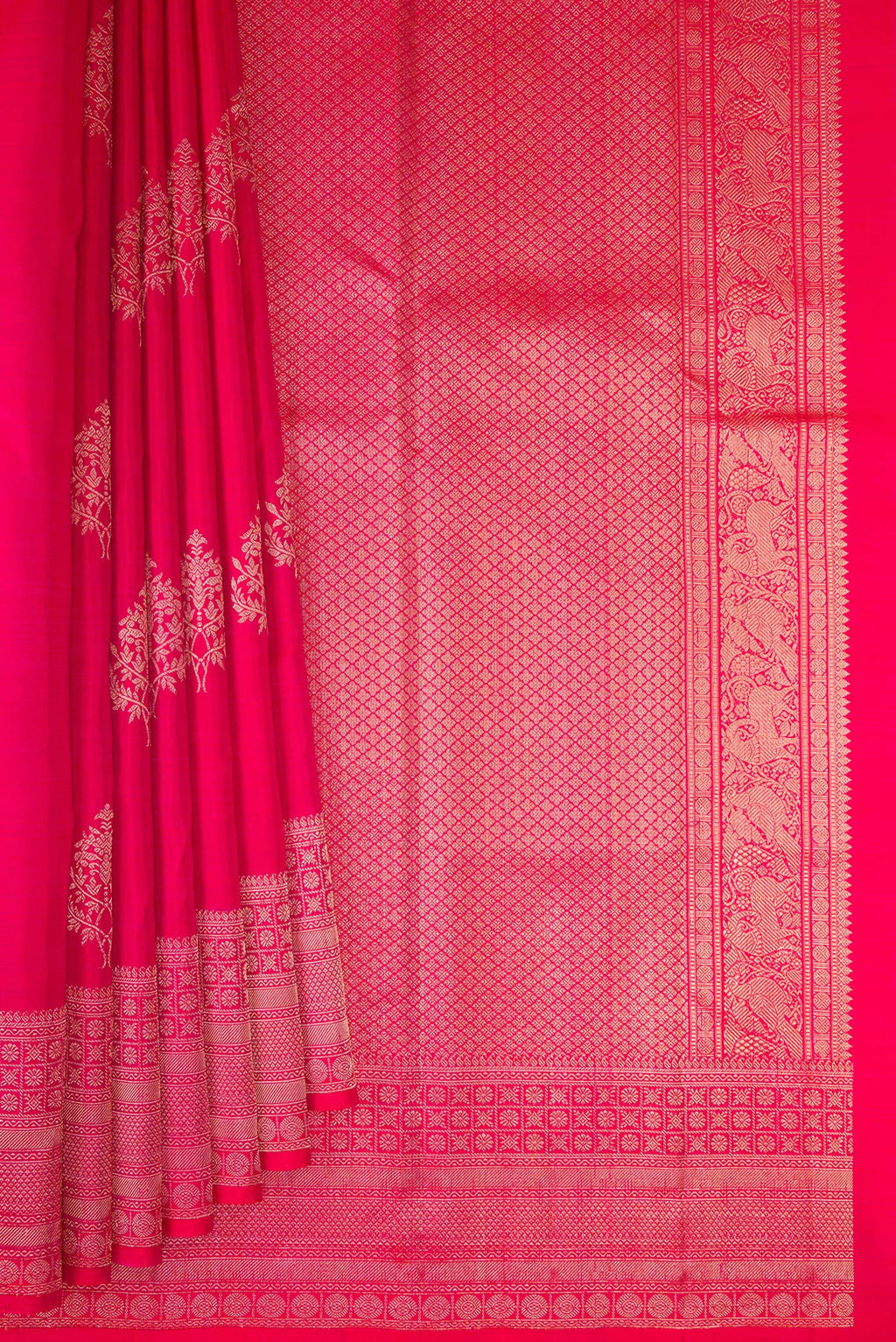 Pleats and pallu of Dark Pink Kanjivaram Silk Saree with Zari Butta on the body and Zari Border. 