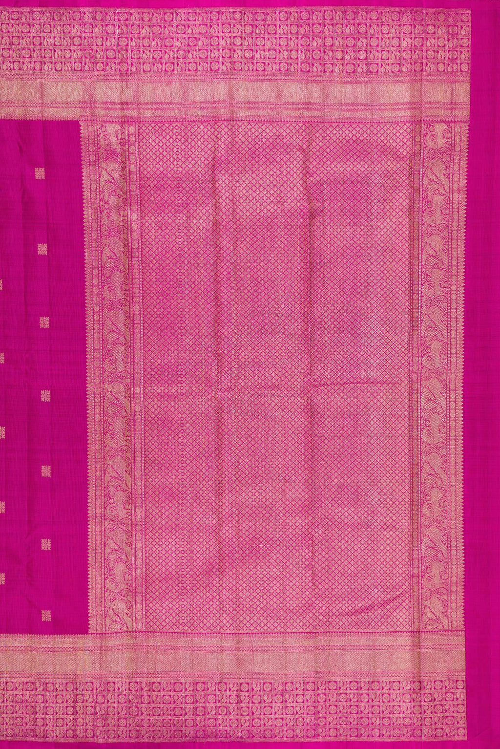 Close up image of the pallu of Magenta Kanjivaram Silk Saree with Zari Butta on the body and Fancy Border. 