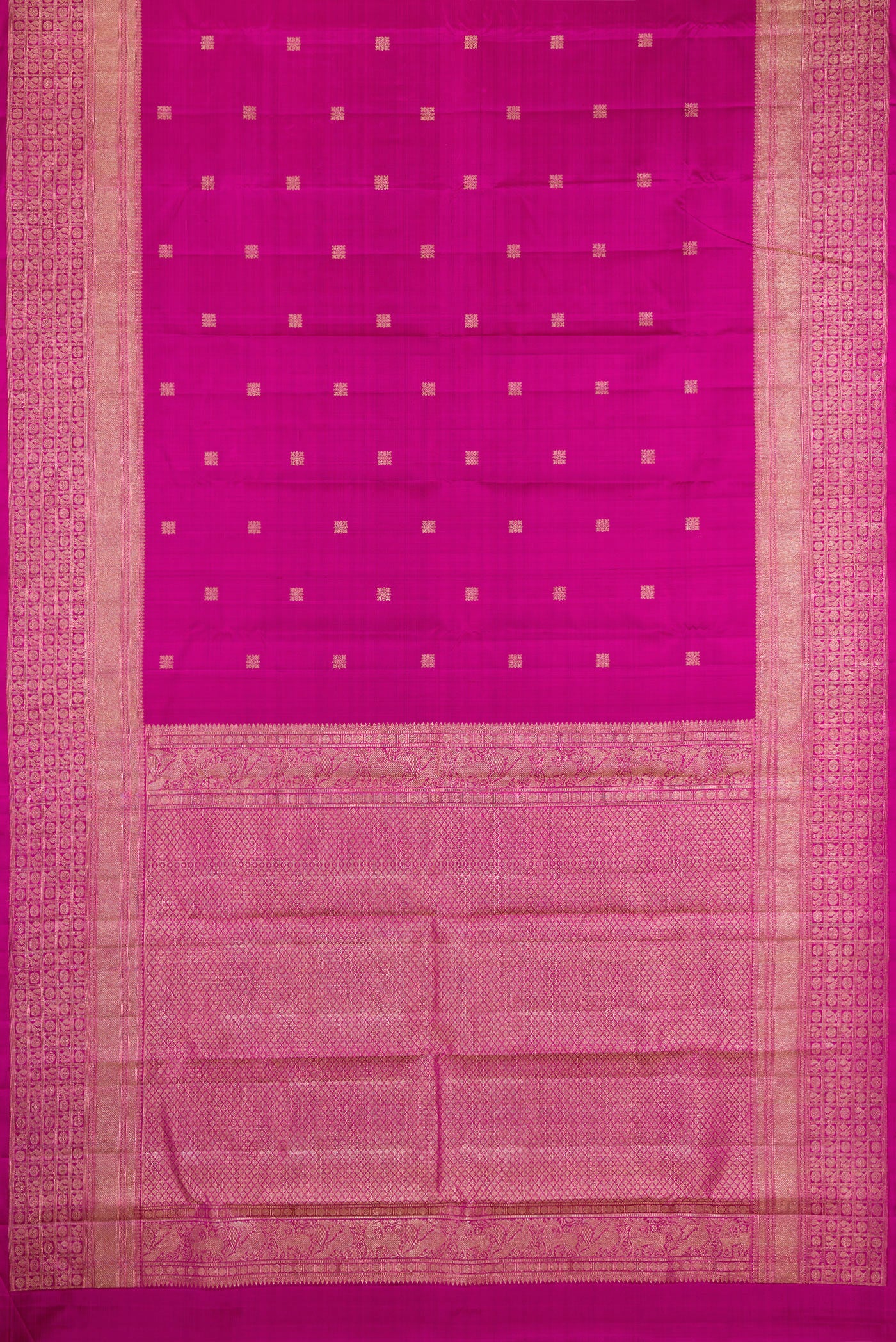 Flat view of Magenta Kanjivaram Silk Saree with Zari Butta on the body and Fancy Border. 