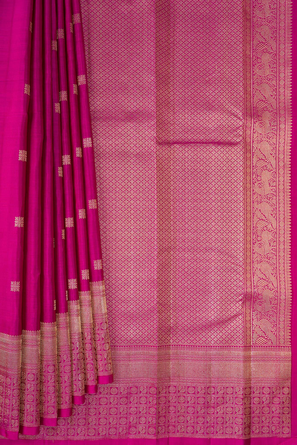 Pleats and pallu of Magenta Kanjivaram Silk Saree with Zari Butta on the body and Fancy Border. 