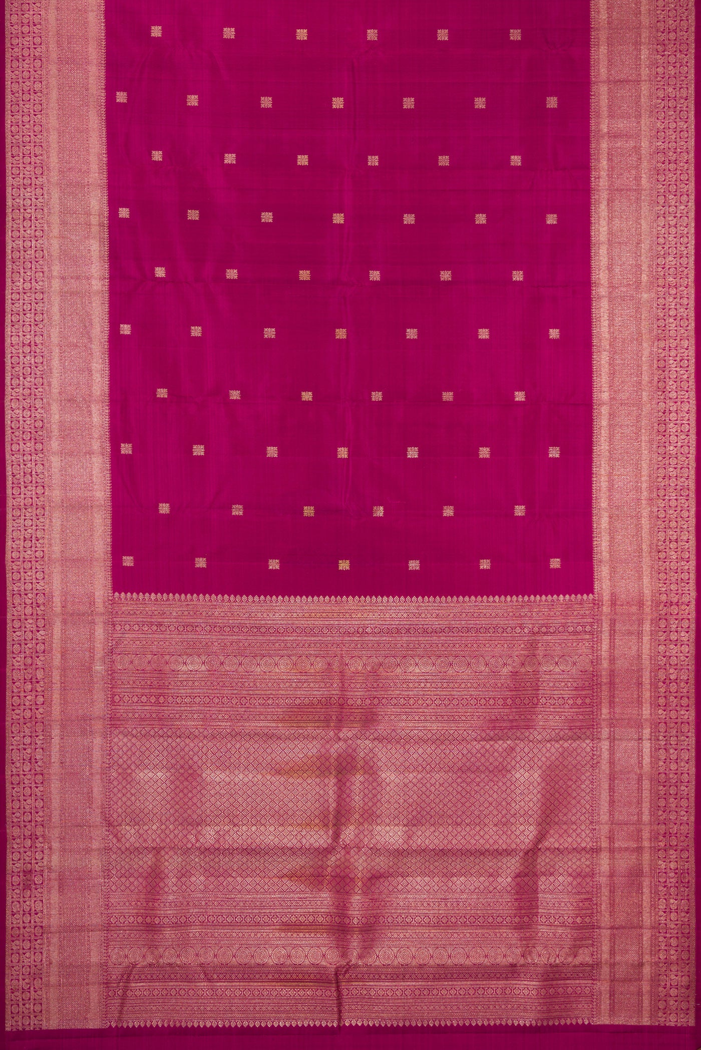 Flat view of Magenta Kanjivaram Silk Saree with Zari Butta on the body and Fancy Border. 