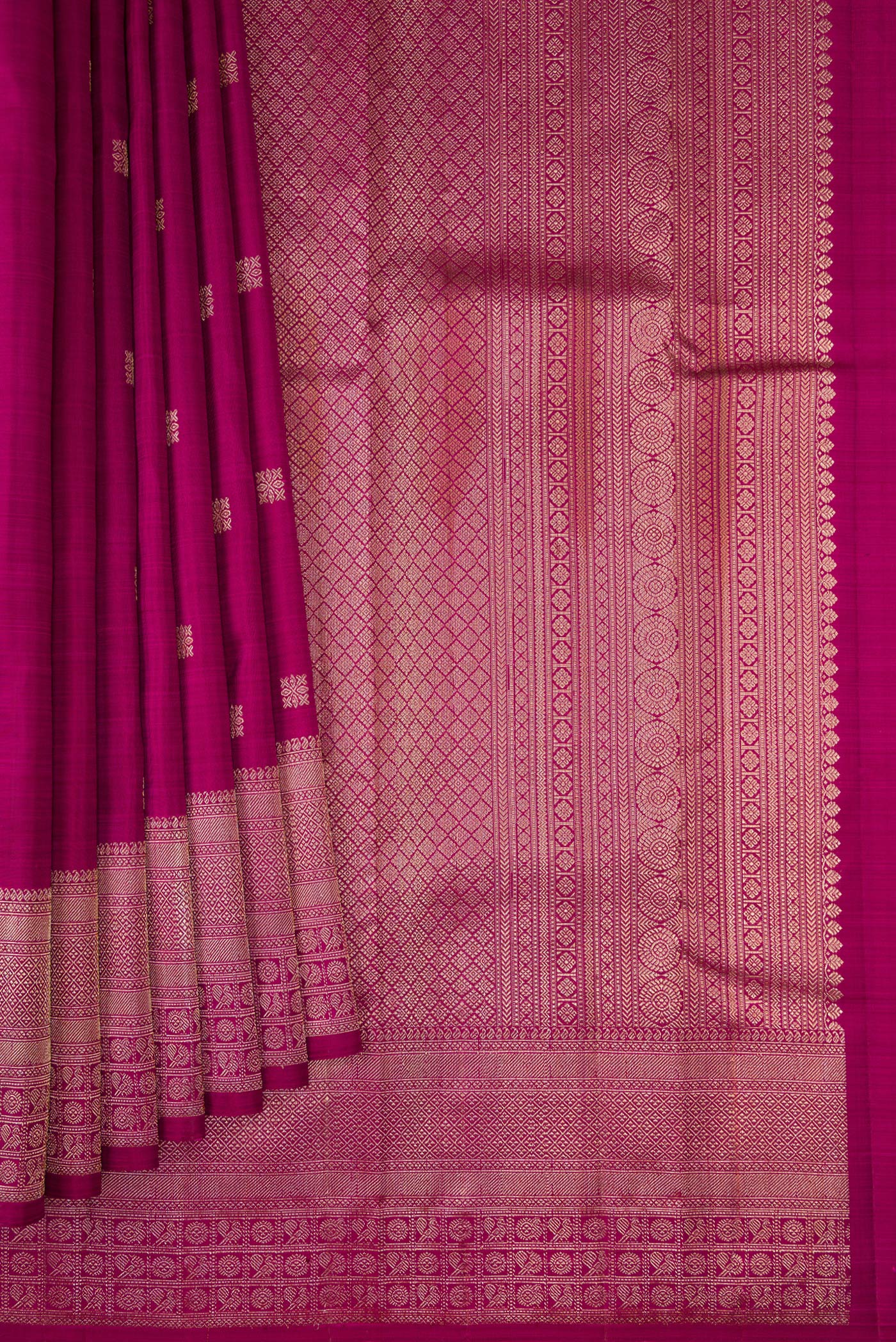 Pleats and pallu of Magenta Kanjivaram Silk Saree with Zari Butta on the body and Fancy Border. 