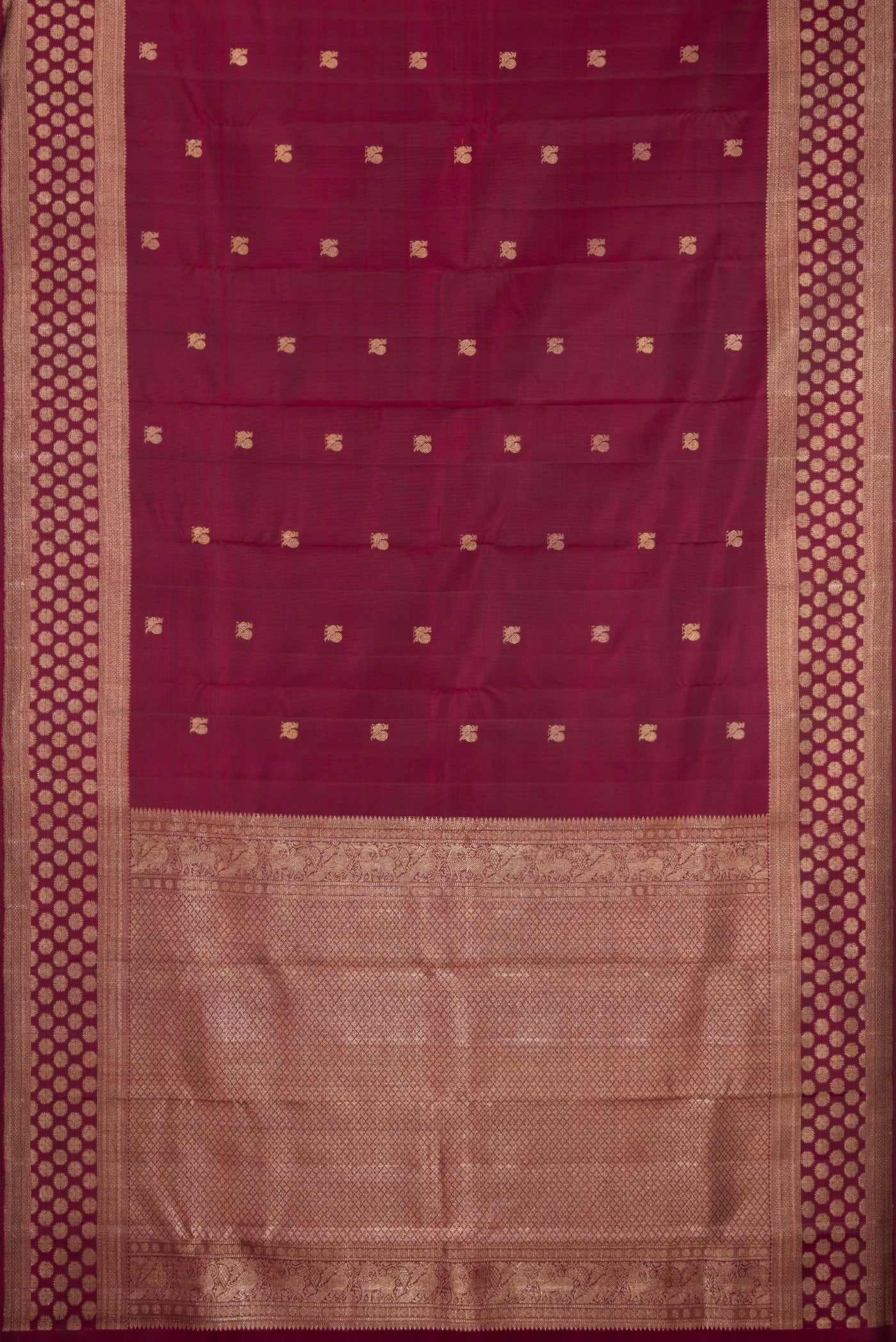 Flat view of Maroon Kanjivaram Silk Saree with Zari Butta on the body and Fancy Border. 