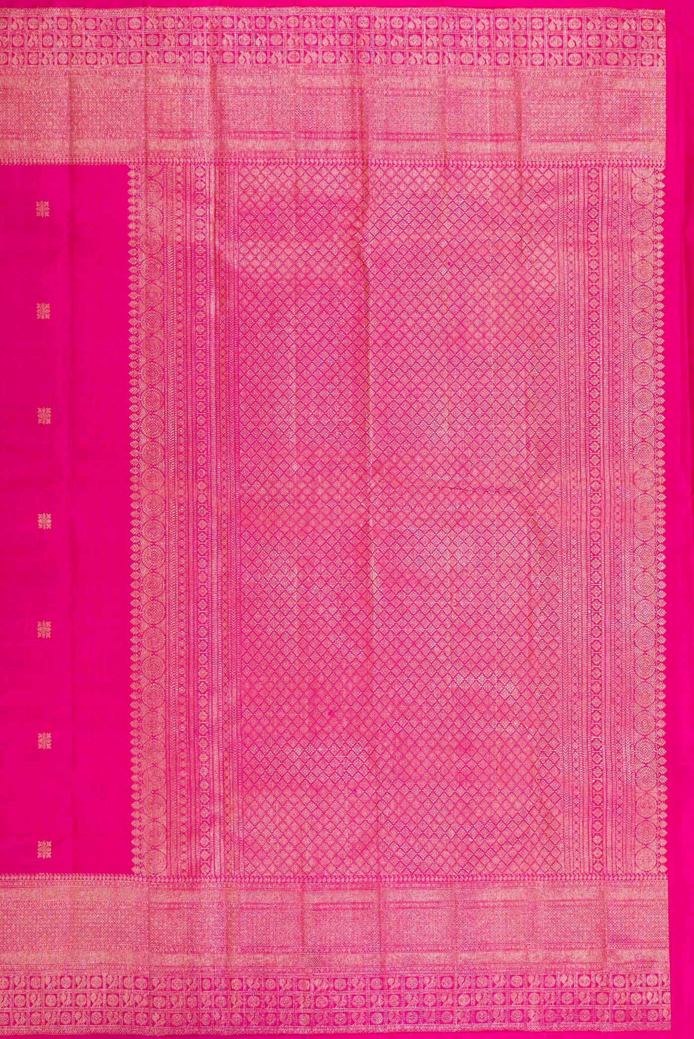 Close up image of the pallu of Dark Pink Kanjivaram Silk Saree with Zari Butta on the body and Fancy Border. 
