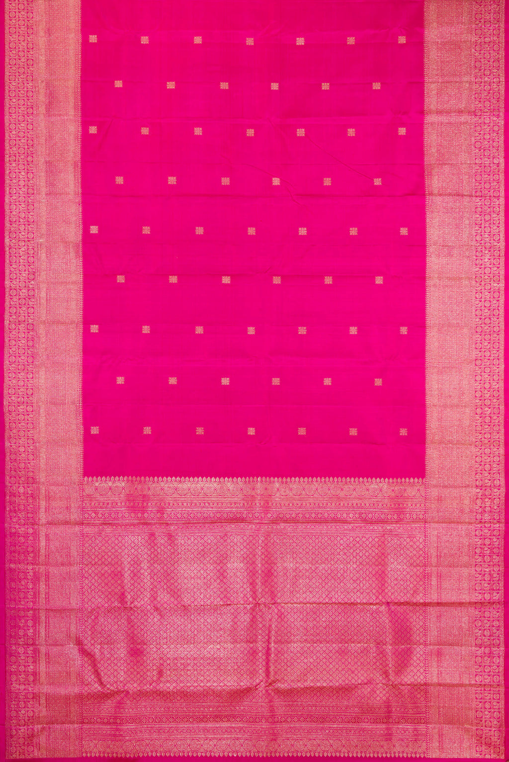Flat view of Dark Pink Kanjivaram Silk Saree with Zari Butta on the body and Fancy Border. 
