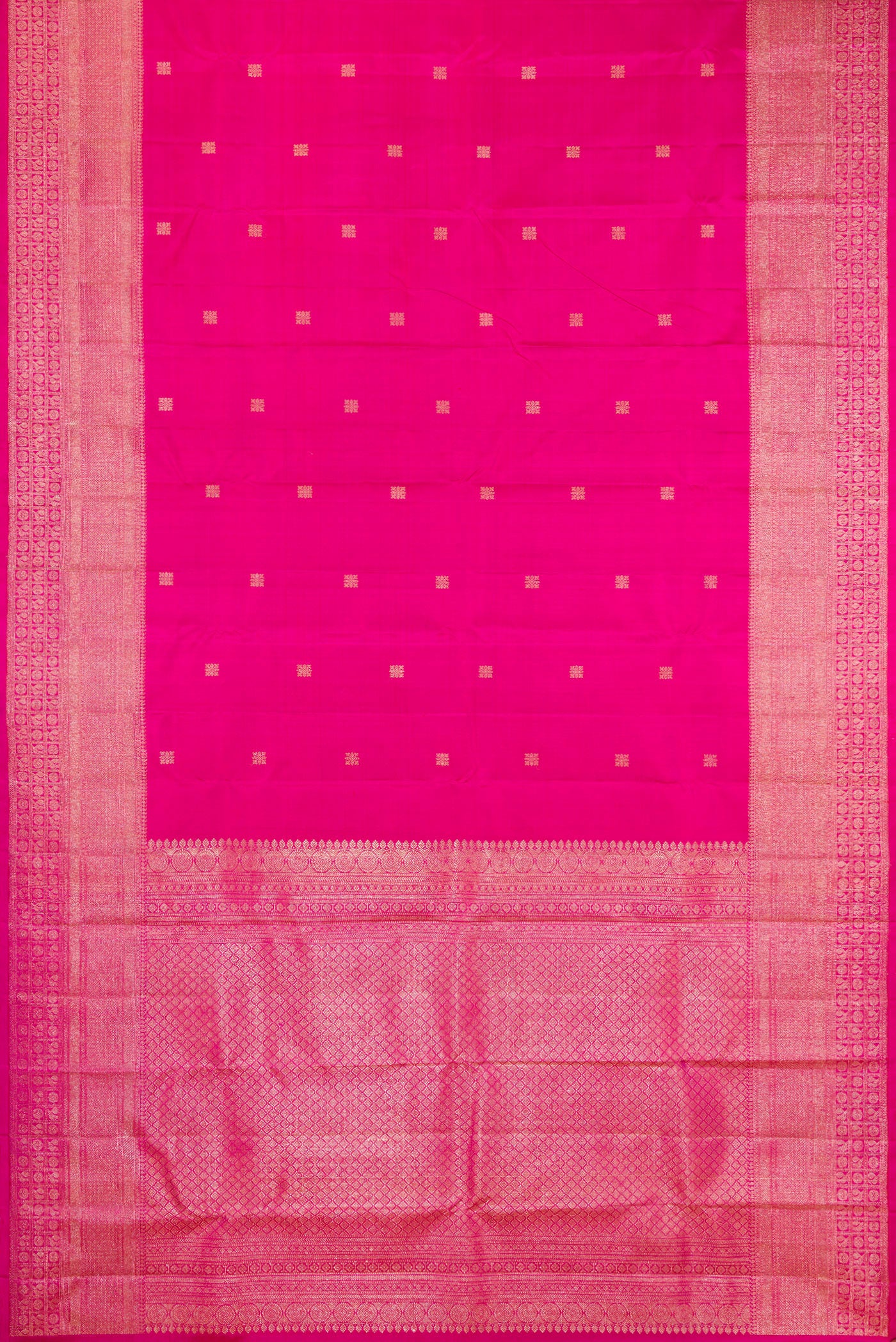 Flat view of Dark Pink Kanjivaram Silk Saree with Zari Butta on the body and Fancy Border. 