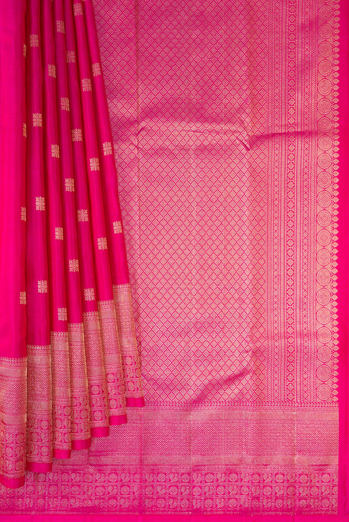 Pleats and pallu of Dark Pink Kanjivaram Silk Saree with Zari Butta on the body and Fancy Border. 