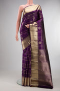 Pure Silk Violet Kanchipuram Saree with Checked design on the body and Zari Border.  displayed on a mannequin