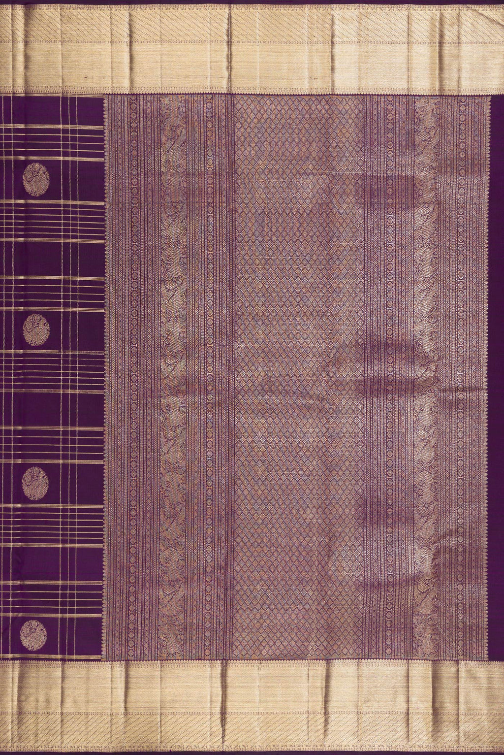 Close up image of the pallu of Pure Silk Violet Kanchipuram Saree with Checked design on the body and Zari Border. 