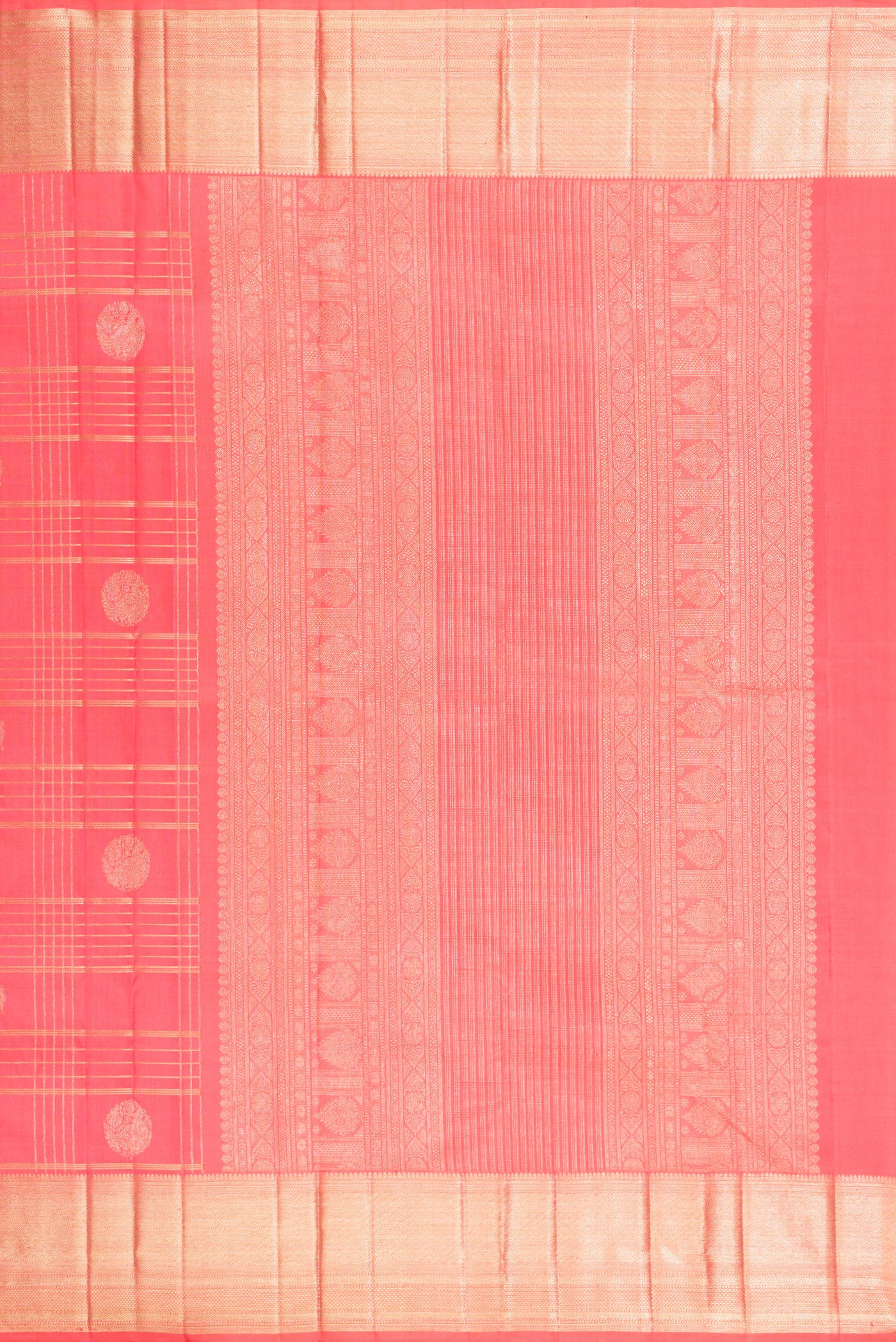 Close up image of the pallu of Coral Kanchipuram Silk Saree with Checked design on the body and Zari Border. 