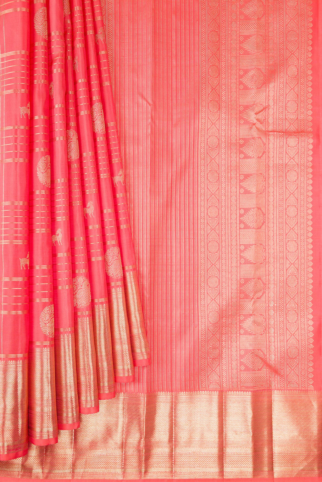 Pleats and pallu of Coral Kanchipuram Silk Saree with Checked design on the body and Zari Border. 