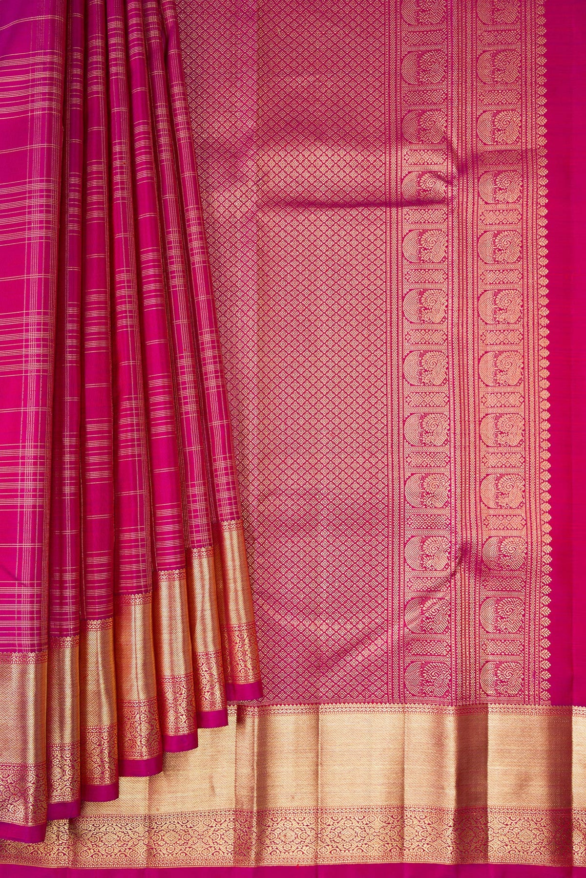 Pleats and pallu of Pure Silk Dark Pink Kanchipuram Saree with Checked design on the body and Zari Border. 
