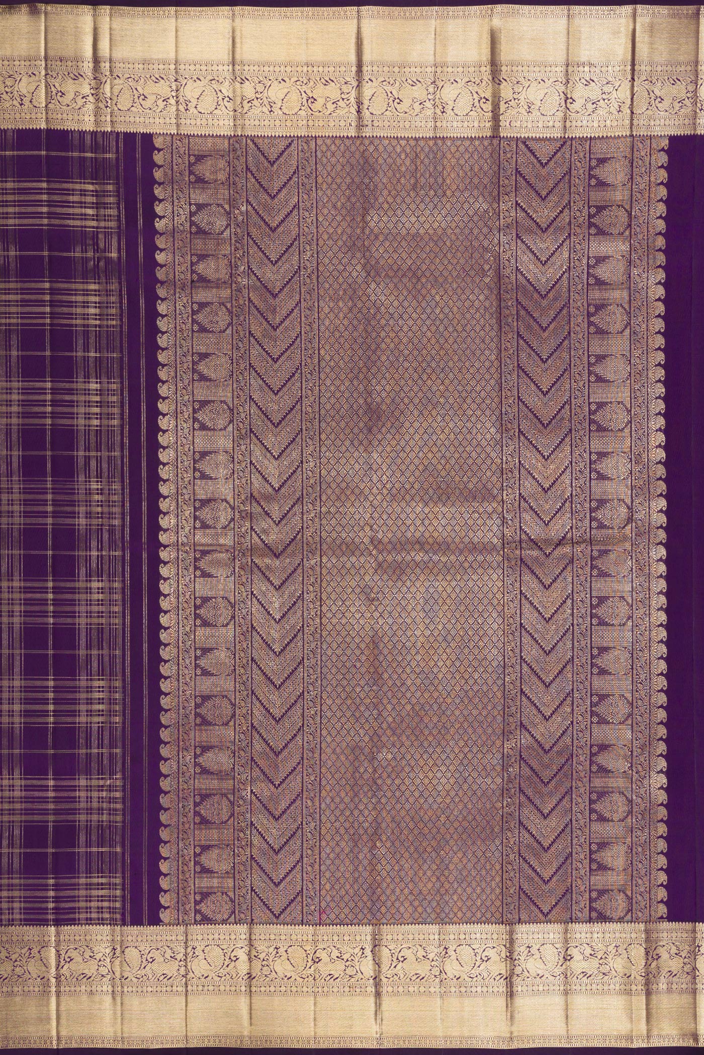 Close up image of the pallu of Violet Kanchipuram Silk Saree with Checked design on the body and Zari Border. 