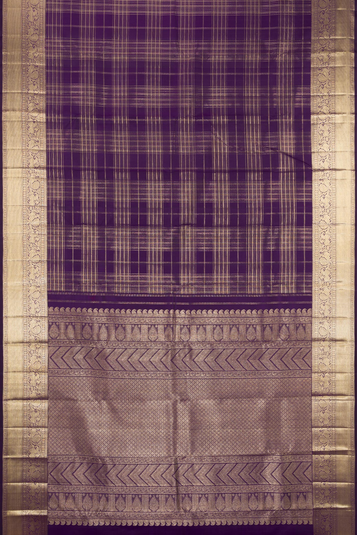 Flat view of Violet Kanchipuram Silk Saree with Checked design on the body and Zari Border. 