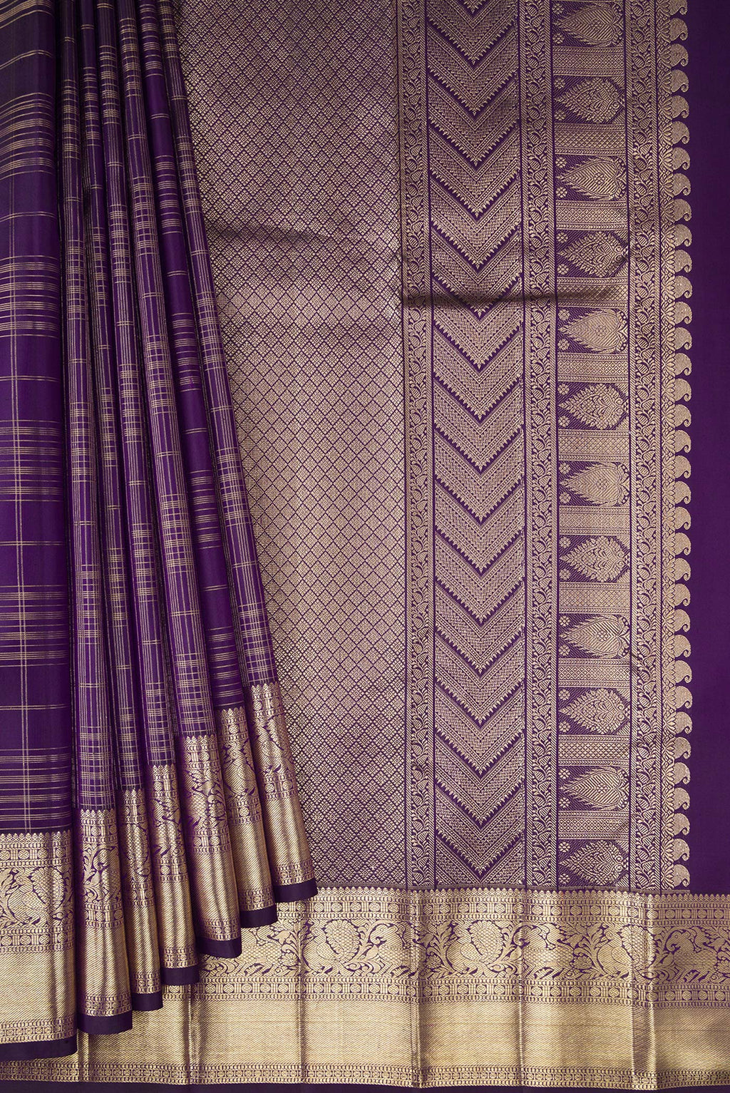 Pleats and pallu of Violet Kanchipuram Silk Saree with Checked design on the body and Zari Border. 