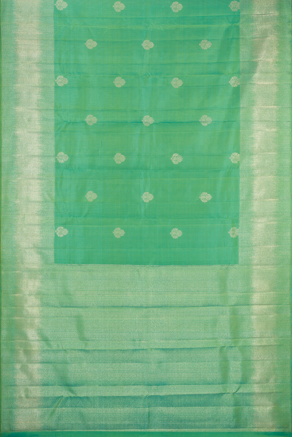 Flat view of Sea Green Kanjivaram Silk Saree with Zari Butta on the body and Fancy Border. 